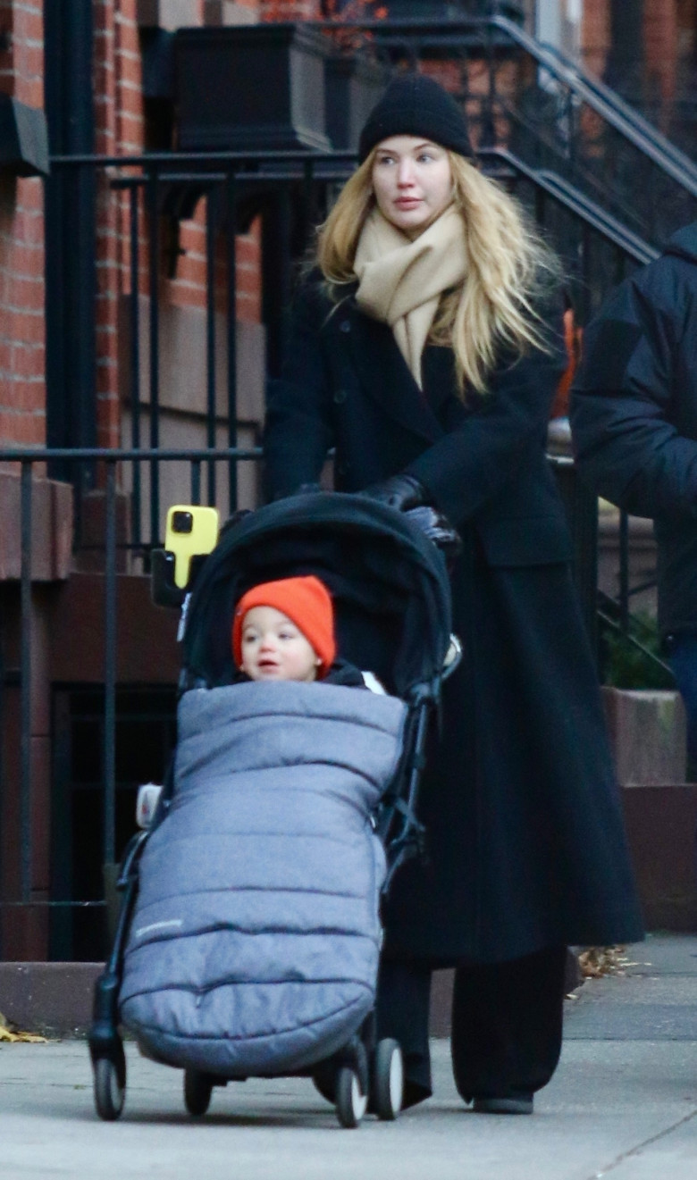 *EXCLUSIVE* Jennifer Lawrence is make-up-free as she bundles up for the cold weather while out with her son Cy in NYC