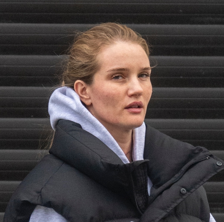 *EXCLUSIVE* *STRICTLY NO SUBSCRIPTIONS AND NO SOCIAL SOCIAL MEDIA USE* Rosie Huntington Whiteley steps out in London with a large scar on her neck.