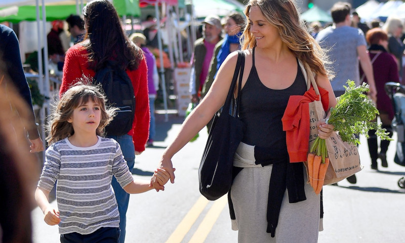 EXCLUSIVE: Newly Single Alicia Silverstone puts on a brave face as she and her son Bear spend some time at a farmer&apos;s market in Los Angeles