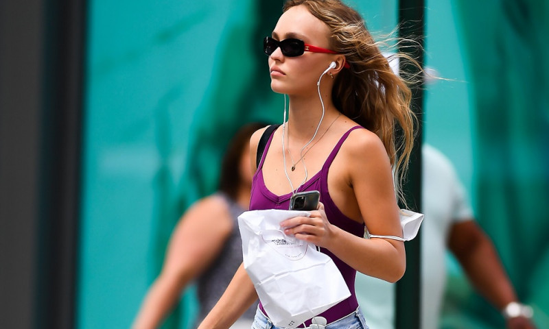 Lily-Rose Depp grabs some food and a water to go in New York City