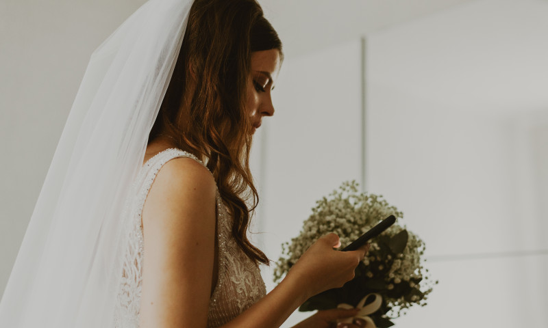 Portrait,Of,A,Young,Unrecognizable,Caucasian,Bride,With,A,Bouquet