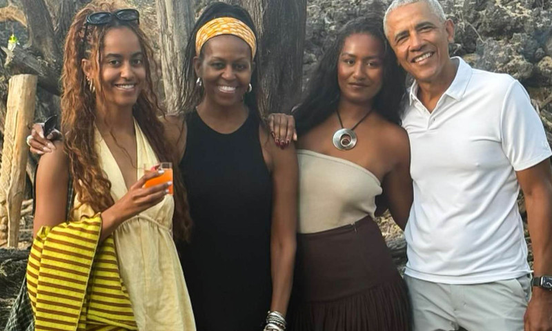 Barack și Michelle Obama, alături de fiicele lor/ Profimedia