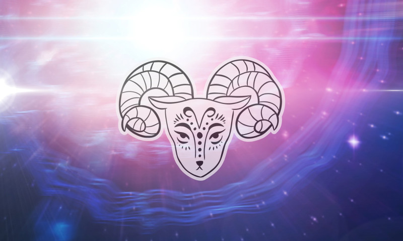 Illustration of black and white capricorn zodiac star sign over stars on pink to purple background