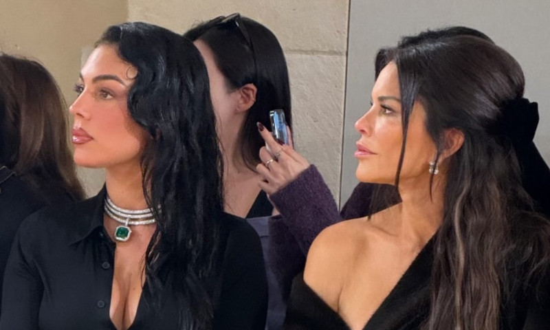 Georgina Rodriguez watching the Balenciaga ss26 show wearing sparkly rings