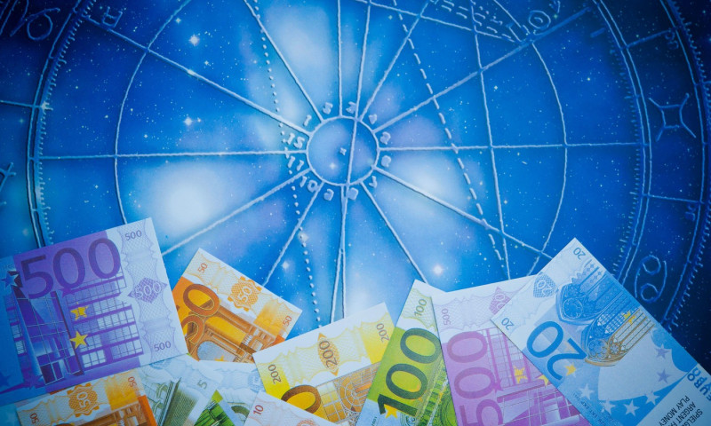 euro and astrology, horoscope for money concept