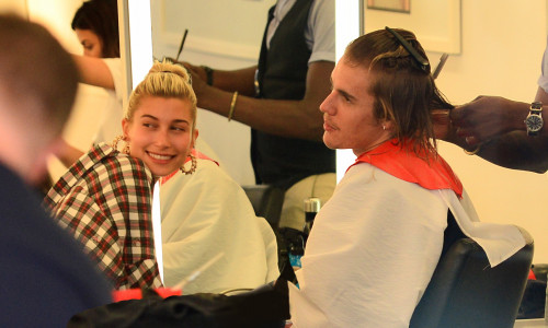 Justin Bieber and Hailey Baldwin all smiles hanging inside salon together while he gets hair cut in New York