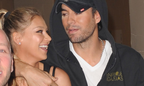 ANNA KOURNIKOVA ENRIQUE IGLESIAS BACKSTAGE DURING THE Y100 S JINGLE BALL CONCERT