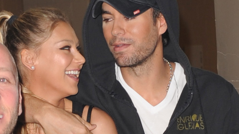 ANNA KOURNIKOVA ENRIQUE IGLESIAS BACKSTAGE DURING THE Y100 S JINGLE BALL CONCERT
