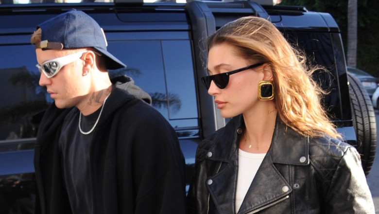 Justin Bieber and Hailey Bieber arrive to church in Los Angeles. The couple arrive hand in hand and compliment one another's looks.