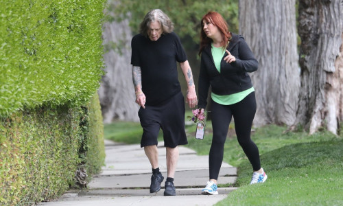 *EXOzzy Osbourne/ ProfimediaCLUSIVE* Ozzy Osbourne out for a walk with his caretaker **WEB MUST CALL*