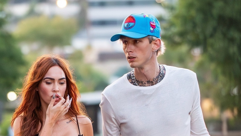 *PREMIUM-EXCLUSIVE* Megan Fox bursts out of lingerie top on a movie date with MGK