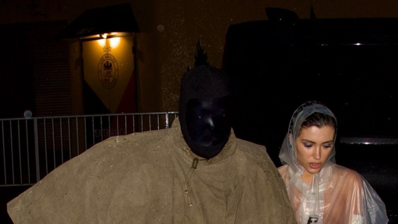 *EXCLUSIVE* Kanye West & Wife Bianca Defy State of Emergency as the Rainswept Couple Bundle up for Studio Session!