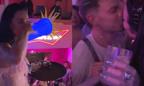 Momentul când Katy Perry se sărută cu un fan în club, în timp ce împarte băuturi alcoolice tuturor/ Foto: Instagram