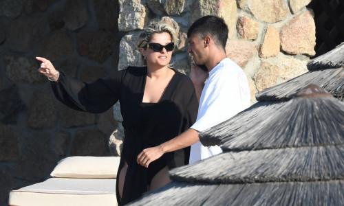 *PREMIUM-EXCLUSIVE* MUST CALL FOR PRICING BEFORE USAGE  - The American Singer Bebe Rexha packs on PDA with her new boyfriend, the Architectural Engineer Simos Liakos as the pair took to the waters with a passionate display during their sun-soaked holiday