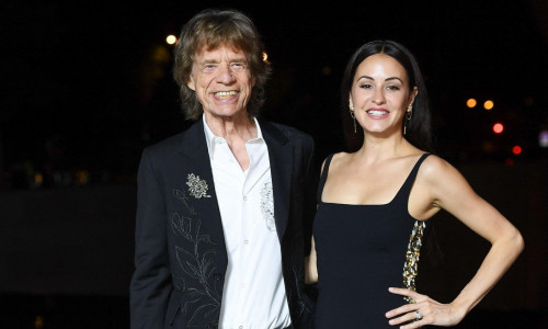 Paris, France. 25th July, 2024. Mick Jagger and Melanie Hamrick attending The Prelude to The Paris Games 2024 at the Vuitton Foundation in Paris, France on July 25, 2024. Photo by Aurore Marechal/ABACAPRESS.COM Credit: Abaca Press/Alamy Live News