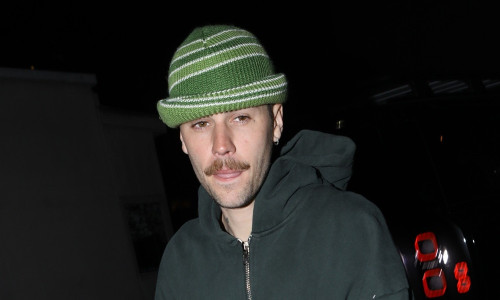 PREMIUM EXCLUSIVE Justin Bieber showing off his moustache at burger restaurant