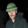 PREMIUM EXCLUSIVE Justin Bieber showing off his moustache at burger restaurant