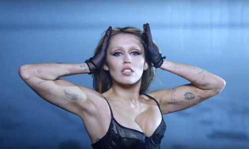 Miley Cyrus and Naomi Campbell steam up the screen as they strip off and strike a pose in Every Girl You've Ever Loved music video