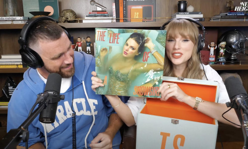 Taylor Swift gets a mouthful of confetti while announcing her upcoming “The Life of a Showgirl” album during an appearance on boyfriend Travis Kelce’s “New Heights” podcast