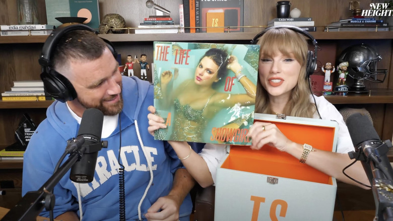 Taylor Swift gets a mouthful of confetti while announcing her upcoming “The Life of a Showgirl” album during an appearance on boyfriend Travis Kelce’s “New Heights” podcast