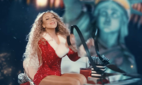 Mariah Carey declares: “It’s Time” for the holidays in true diva fashion with an elf showdown in new Christmas video