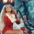 Mariah Carey declares: “It’s Time” for the holidays in true diva fashion with an elf showdown in new Christmas video