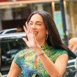 Dua Lipa turns heads in butterfly dress and knee-high boots at Selfridges pop-up launch