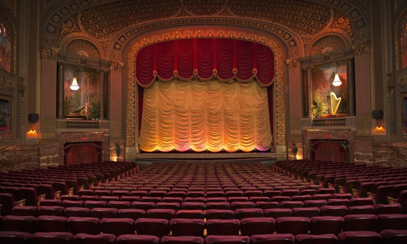 Empty seats in ornate movie theater