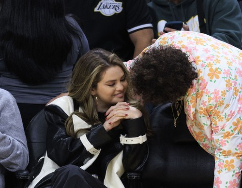 Selena Gomez and Benny Blanco at Lakers vs Heat game