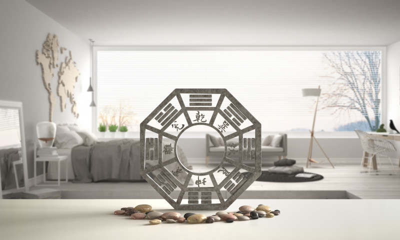 White table shelf with bagua and pebble stone, white scandinavian bedroom with big panoramic window, zen concept interior design, feng shui template idea background