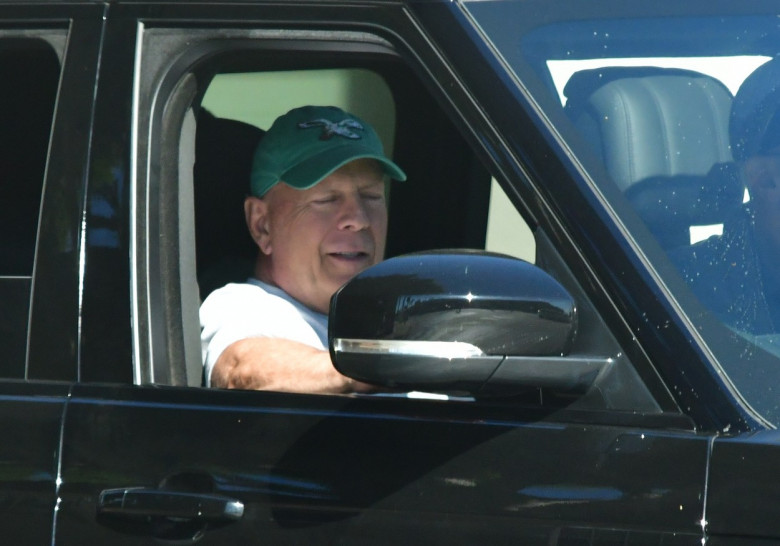 EXCLUSIVE: Bruce Willis Spotted Wearing A Philadelphia Eagles Cap While Out For A Drive With His Caregivers In Brentwood, CA