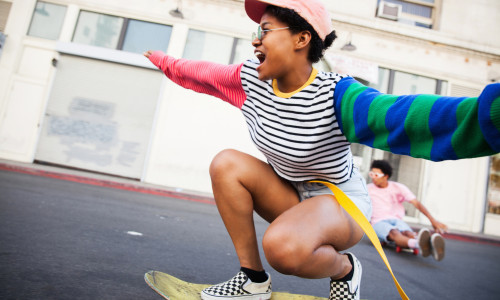 Young woman skateboarding