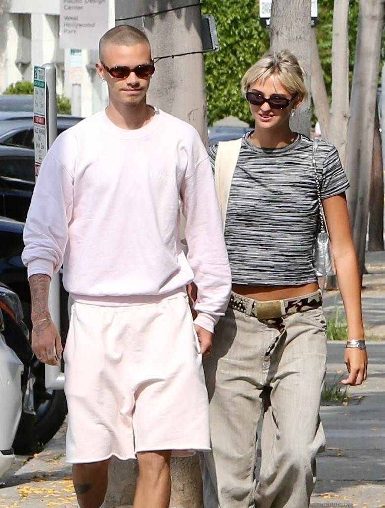 *EXCLUSIVE* Romeo Beckham and Mia Regan turn heads with their stylish shopping spree at FWRD in West Hollywood