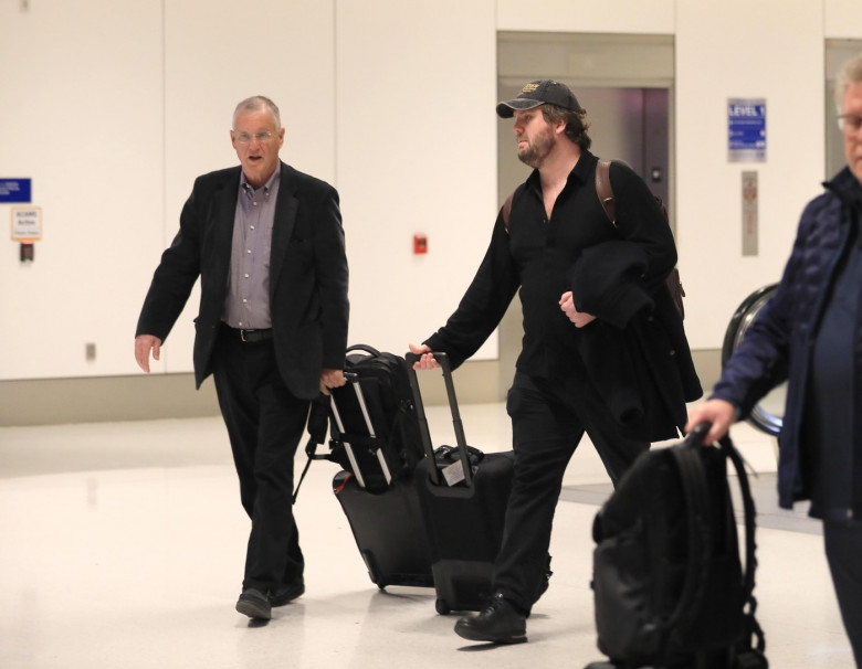 *PREMIUM-EXCLUSIVE* Taylor Swift's Dad, Brother and team arrive in Los Angeles ahead of the 2024 Grammy Awards
