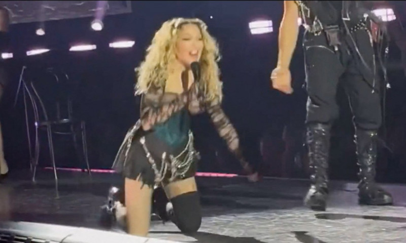 Madonna tumbles off chair on stage in Seattle