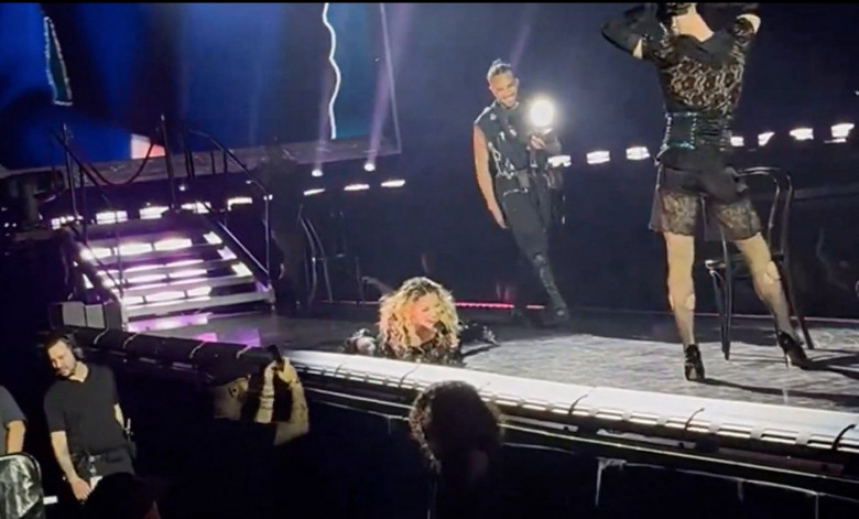 Madonna tumbles off chair on stage in Seattle