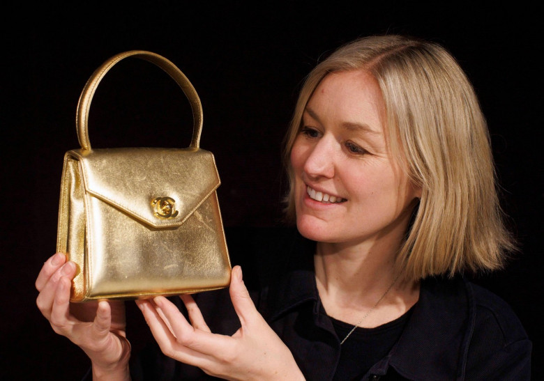 London, UK. 26th Feb, 2024. Karl Lagerfeld for Chanel: a Metallic Gold Top Handle Mini Kelly Bag 1996-97, Est £2,000-£3,000 Press preview of the Designer Handbags and Fashion sale at Bonhams Knightsbridge. The sale will take place on Wednesday 28 February