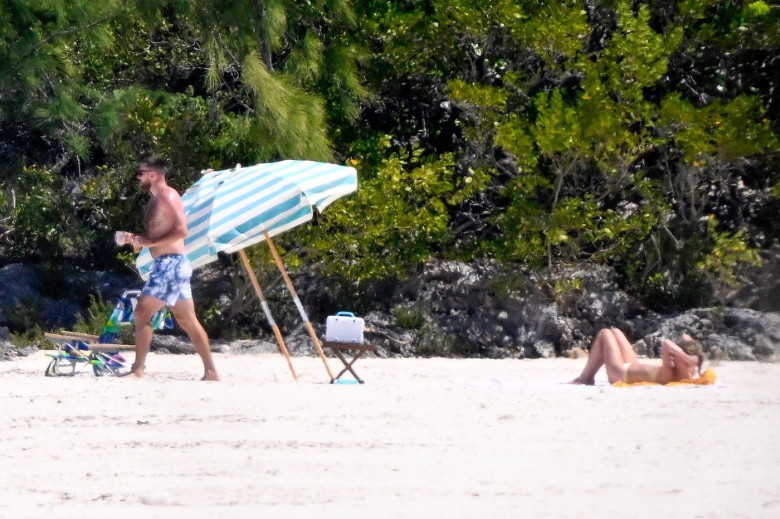 *PREMIUM-EXCLUSIVE* Taylor Swift and Travis Kelce are seen enjoying a very PDA filled day on the beach after a whirlwind year!