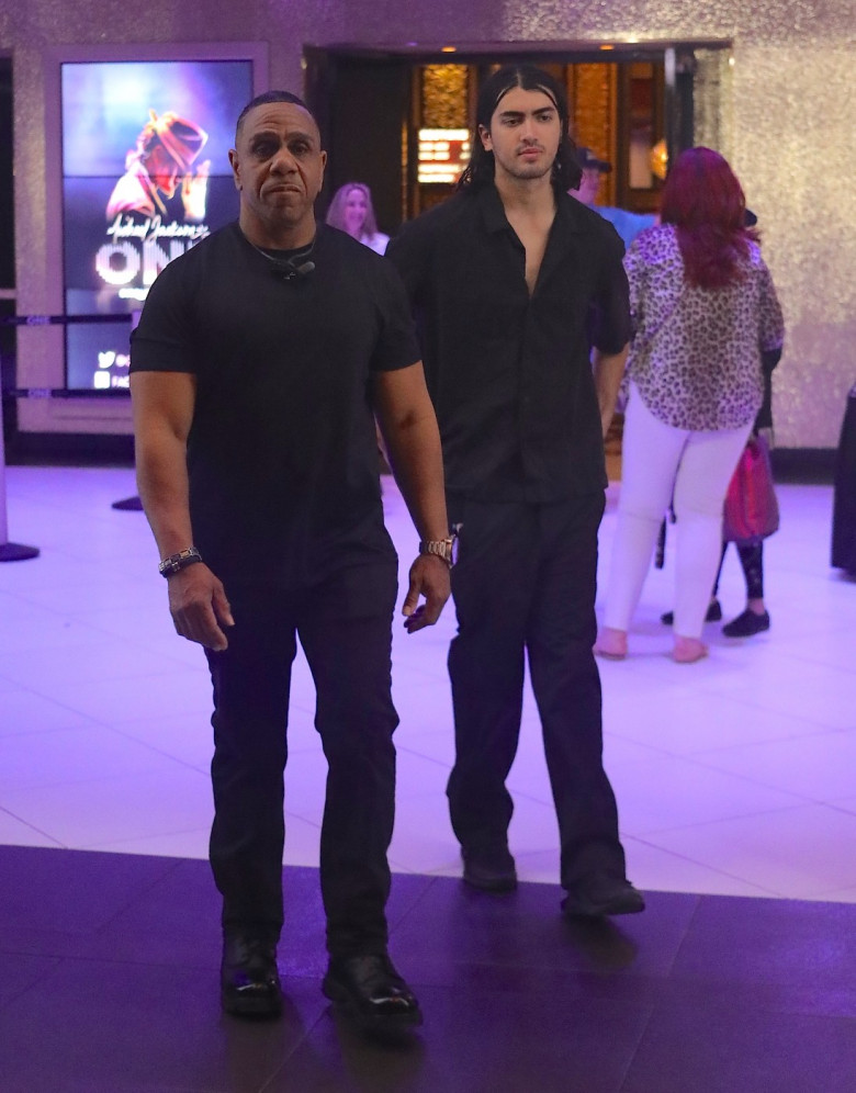 Blanket Jackson Who Is Now 21 Departs His Father's Special 65th Birthday Remember At The Michael Jackson One Theater As He Is Escorted By His Security In Las Vegas