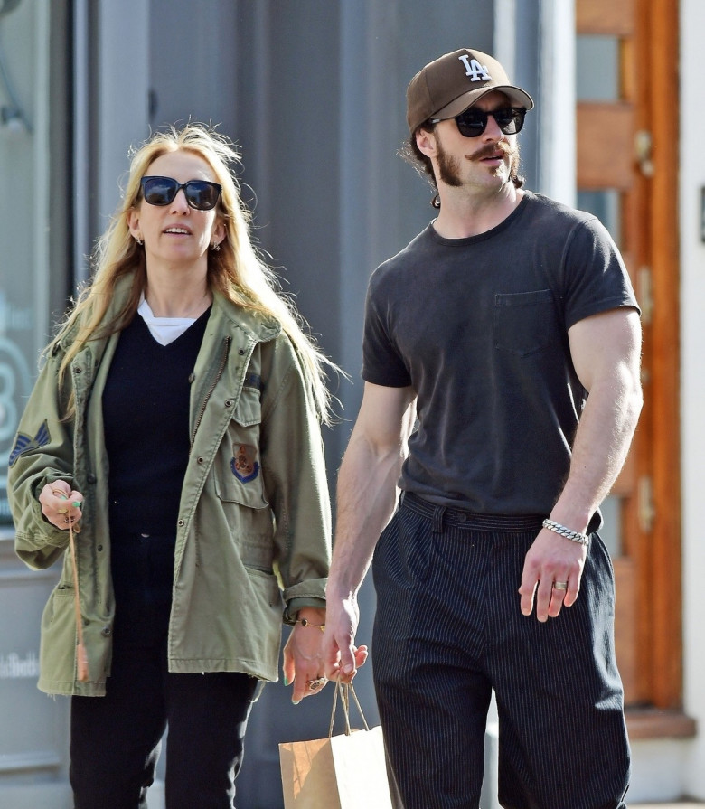 *EXCLUSIVE* Perhaps this isn't the look the producers were looking for as Aaron Taylor-Johnson who is tipped to be the new James Bond cuts a rather striking appearance as he takes a stroll with wife Sam Taylor-Johnson out in London's Notting Hill.*PICTUR