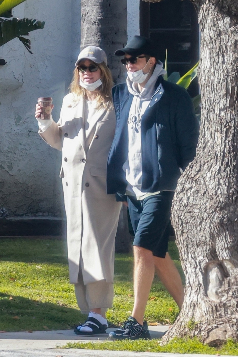*EXCLUSIVE* Robert Pattinson and Suki Waterhouse are all smiles while on a coffee run