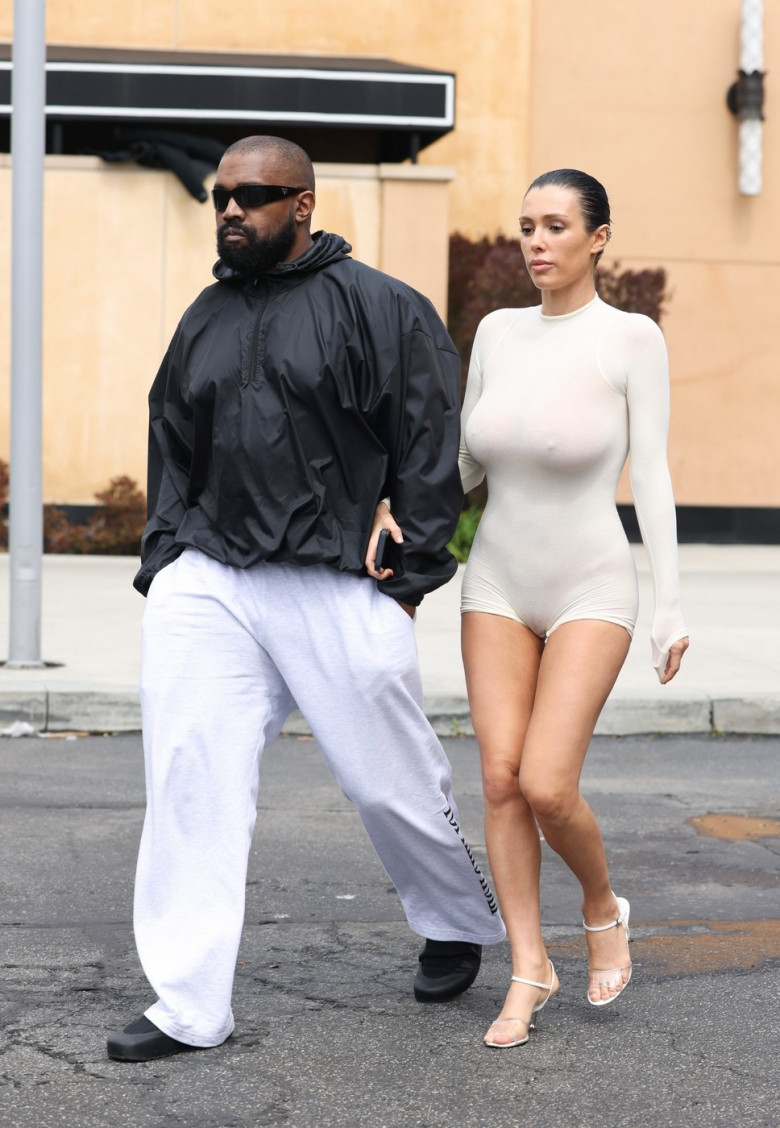 *PREMIUM-EXCLUSIVE* Bianca Censori puts on a VERY busty display while walking around the Oxnard mall after eating at Cheesecake Factory with husband Kanye West