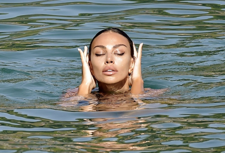 *EXCLUSIVE* The Romanian Actress and Model Madalina Diana Ghenea enjoying her time at the beach with rumoured boyfriend Andrea Castagnola at Paraggi beach.
