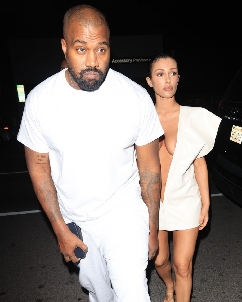 Kanye West &amp; wife Bianca Censori match in all white ensembles while arriving at Ty Dolla Sign birthday party in WeHo