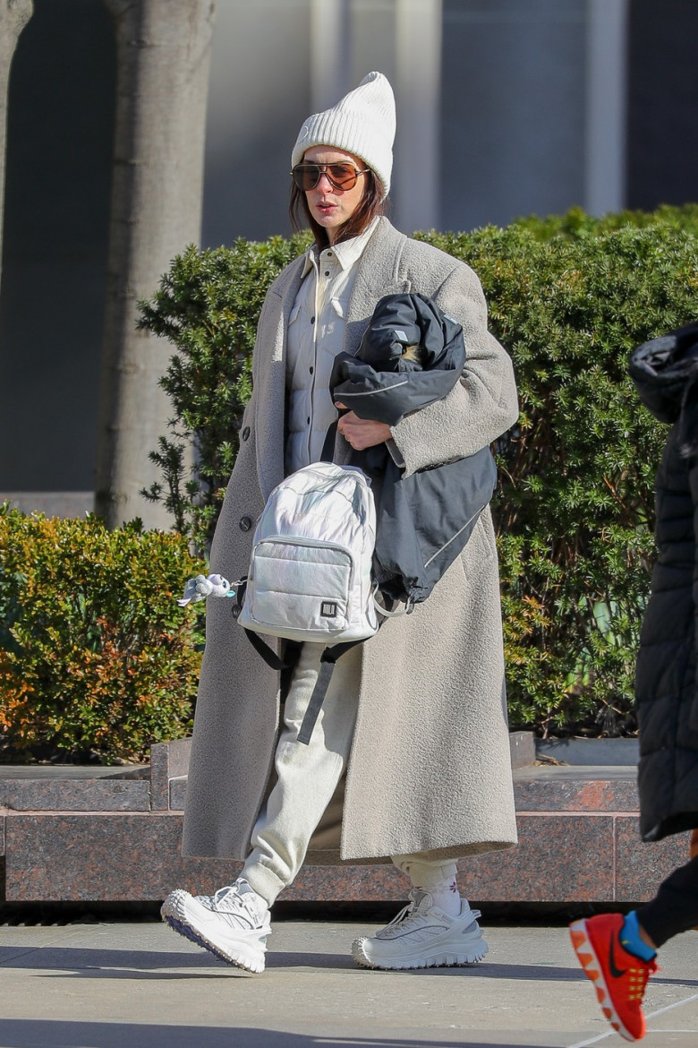 EXCLUSIVE: Anne Hathaway Flashes a Smile as She Steps Out in New York City.