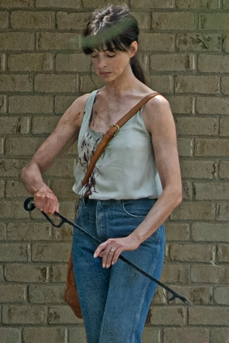 *EXCLUSIVE* Anne Hathaway is covered in blood on 'Flowervale Street' set filming in Atlanta - ** WEB MUST CALL FOR PRICING **