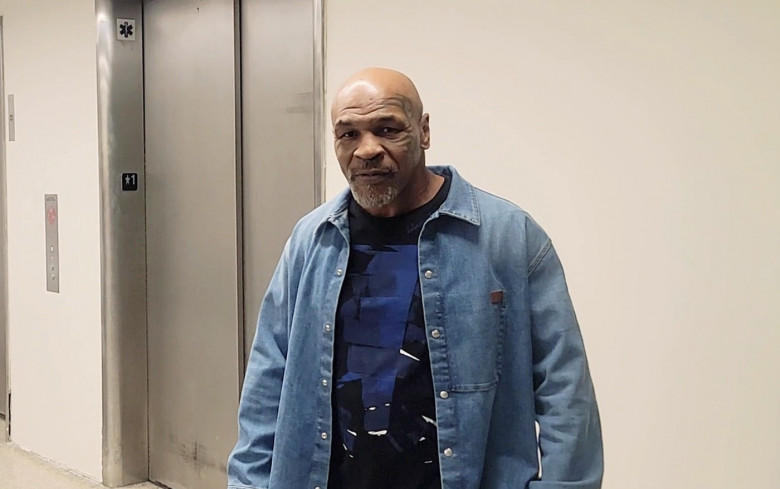 PREMIUM EXCLUSIVE Mike Tyson Shows Softer Side By Greeting Videographer With A Hug