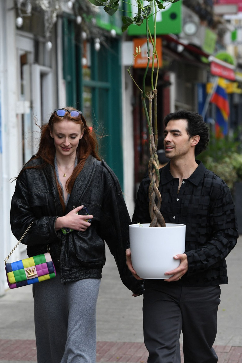 EXCLUSIVE: The Jonas Bothers, Joe, Nick &amp; Kevin head to lunch at a Cafe in Holloway Road in North London to continue their promotional tour of London to promote their new music. Joined by Joes wife Sophie Turner as she arrived in a very revealing two piec