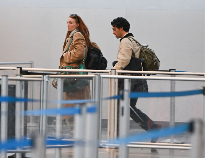 EXCLUSIVE: The Jonas Brothers and Sophie Turner are Spotted Catching a Flight at JFK Airport in New York City.