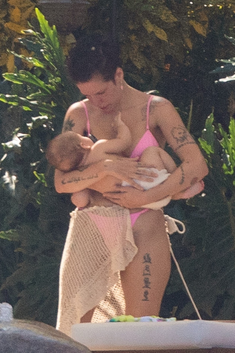 *EXCLUSIVE* Halsey cradles her baby in a bikini while vacationing in Vallarta with boyfriend Alev Aydin and family